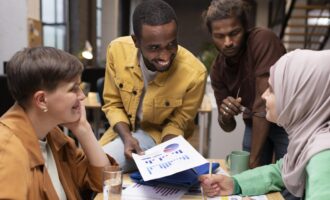 close-up-happy-colleagues-table